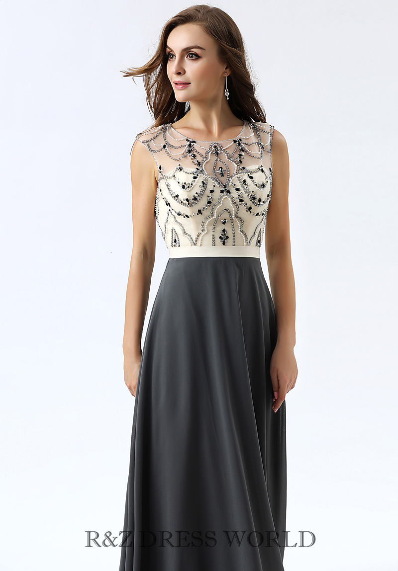 Cream net top with beading and black skirt
